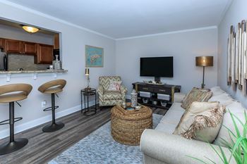 A living room with a couch and a tv